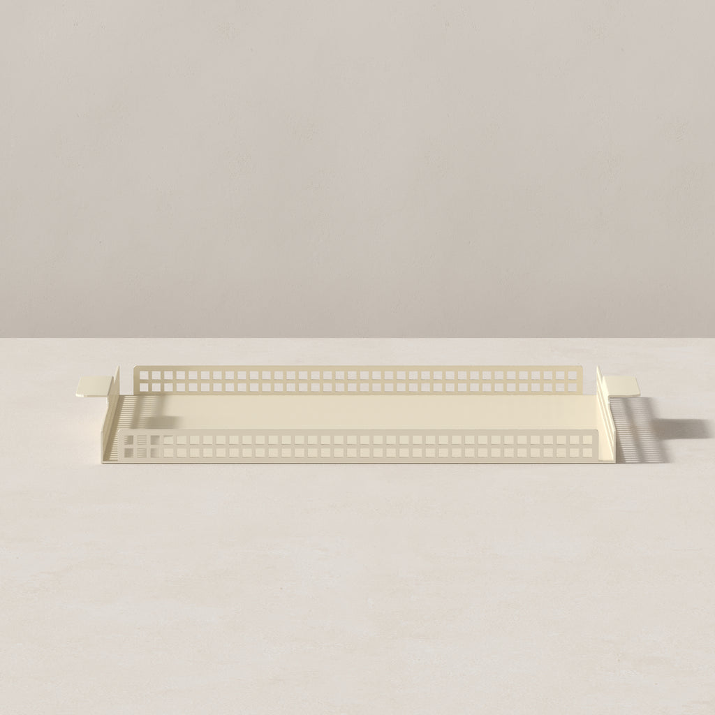 Side profile of butter cream Art Deco serving tray with slim steel frame and grid edge