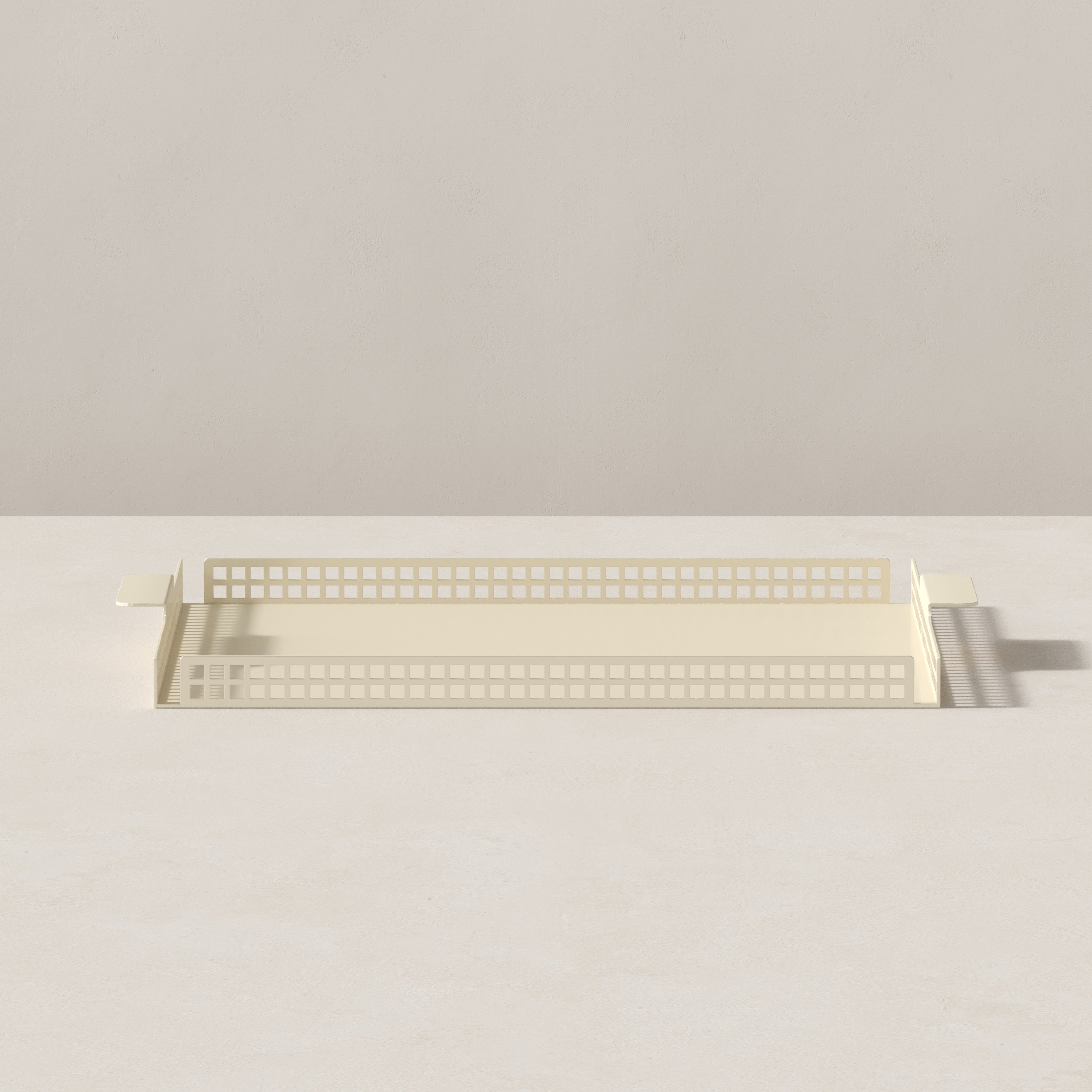 Side profile of butter cream Art Deco serving tray with slim steel frame and grid edge