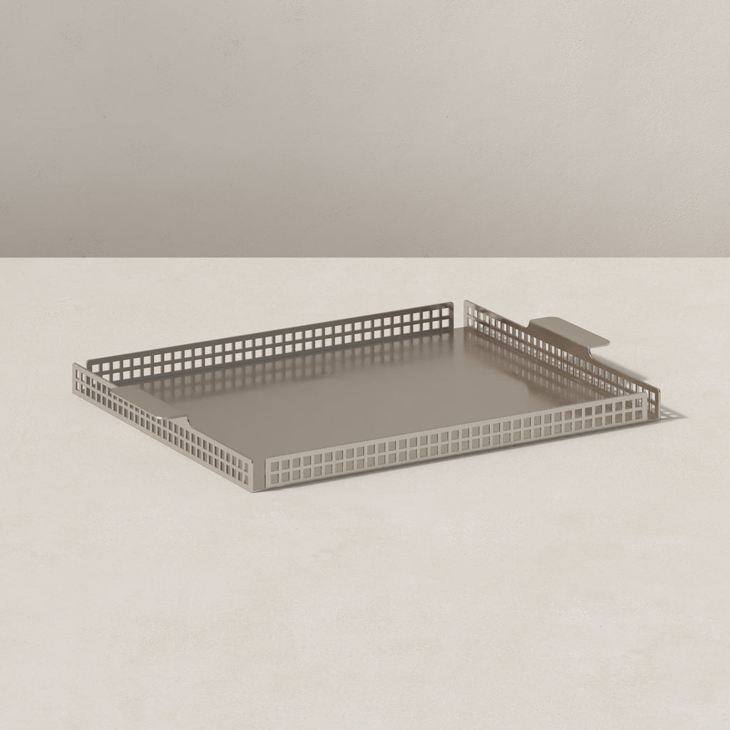 Art Deco nickel serving tray, end view highlighting geometric perforated edge detail