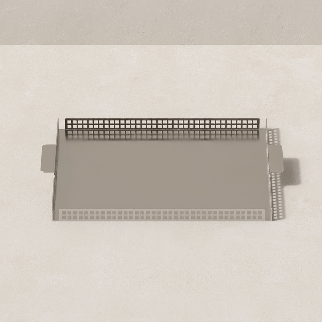Top view of Art Deco nickel serving tray with rectangular form and perforated steel border