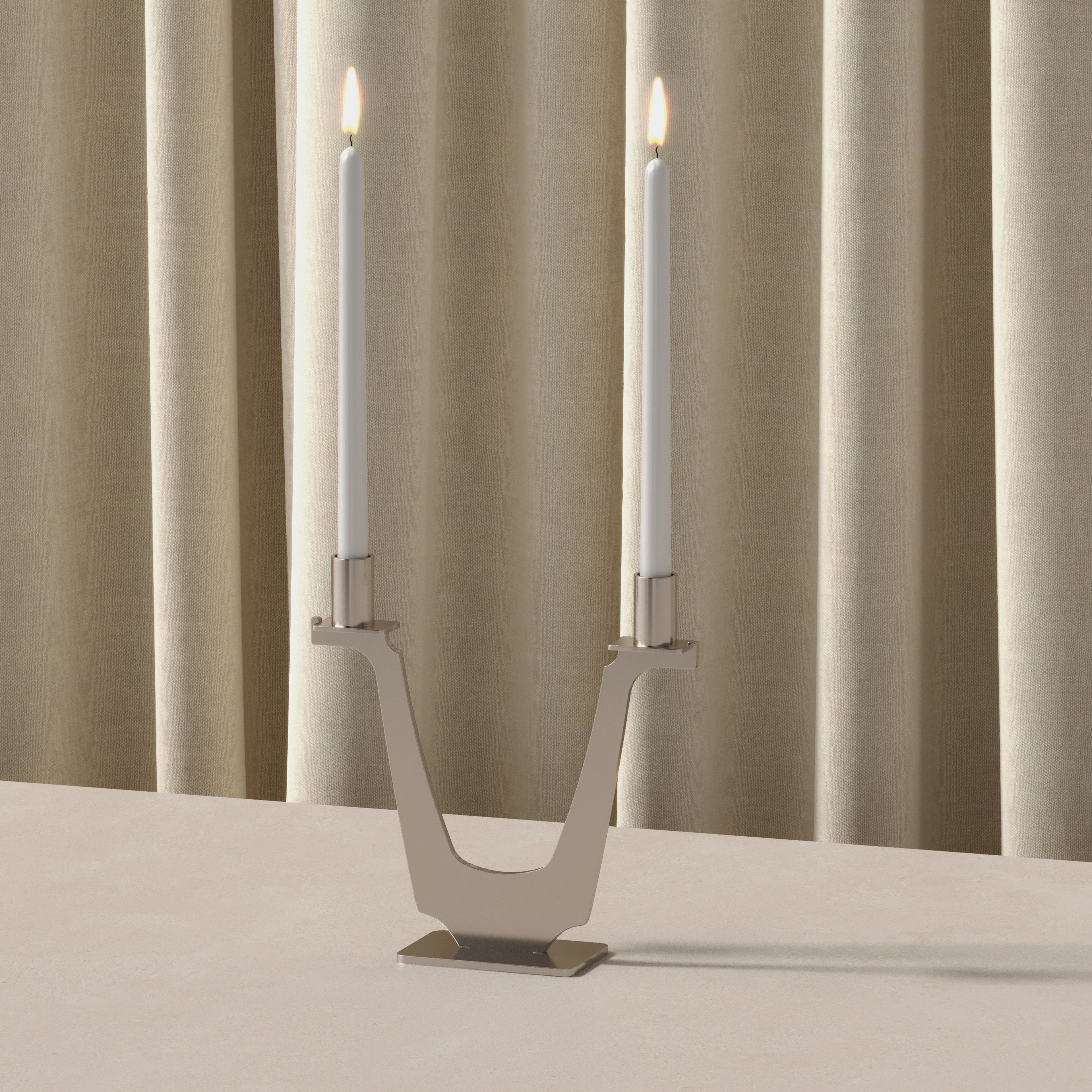 Art Deco steel double candle holder with two taper candles, modern sculptural candelabra