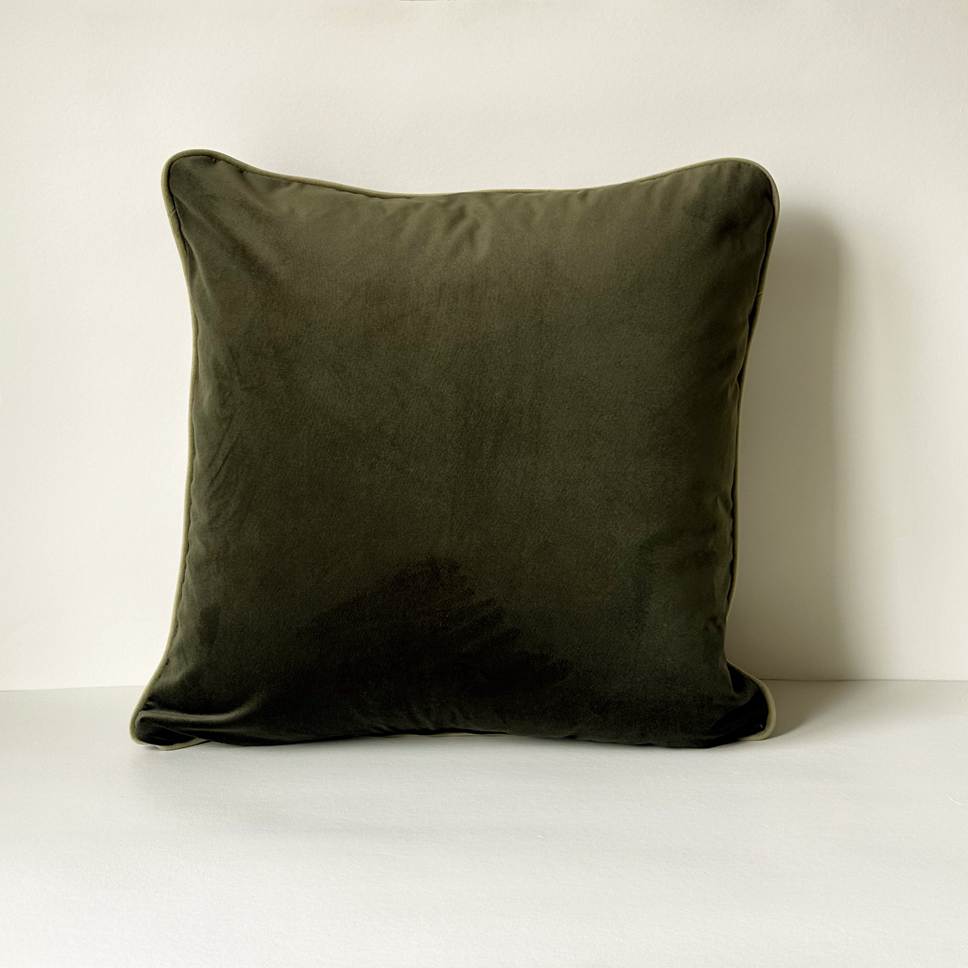 Square Atelier Cushion in Forest Noir velvet with contrasting piped edge back view