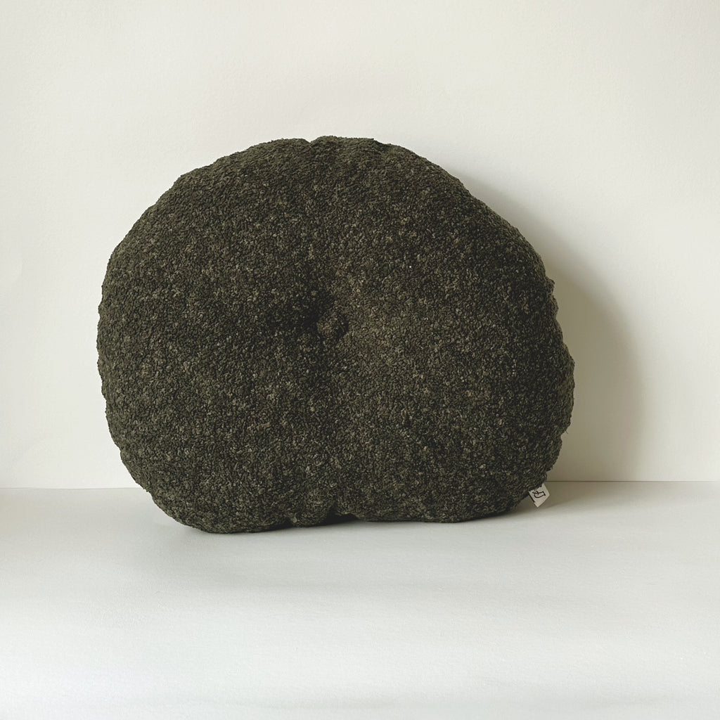 Cloud Cushion in moss bouclé shown from the side