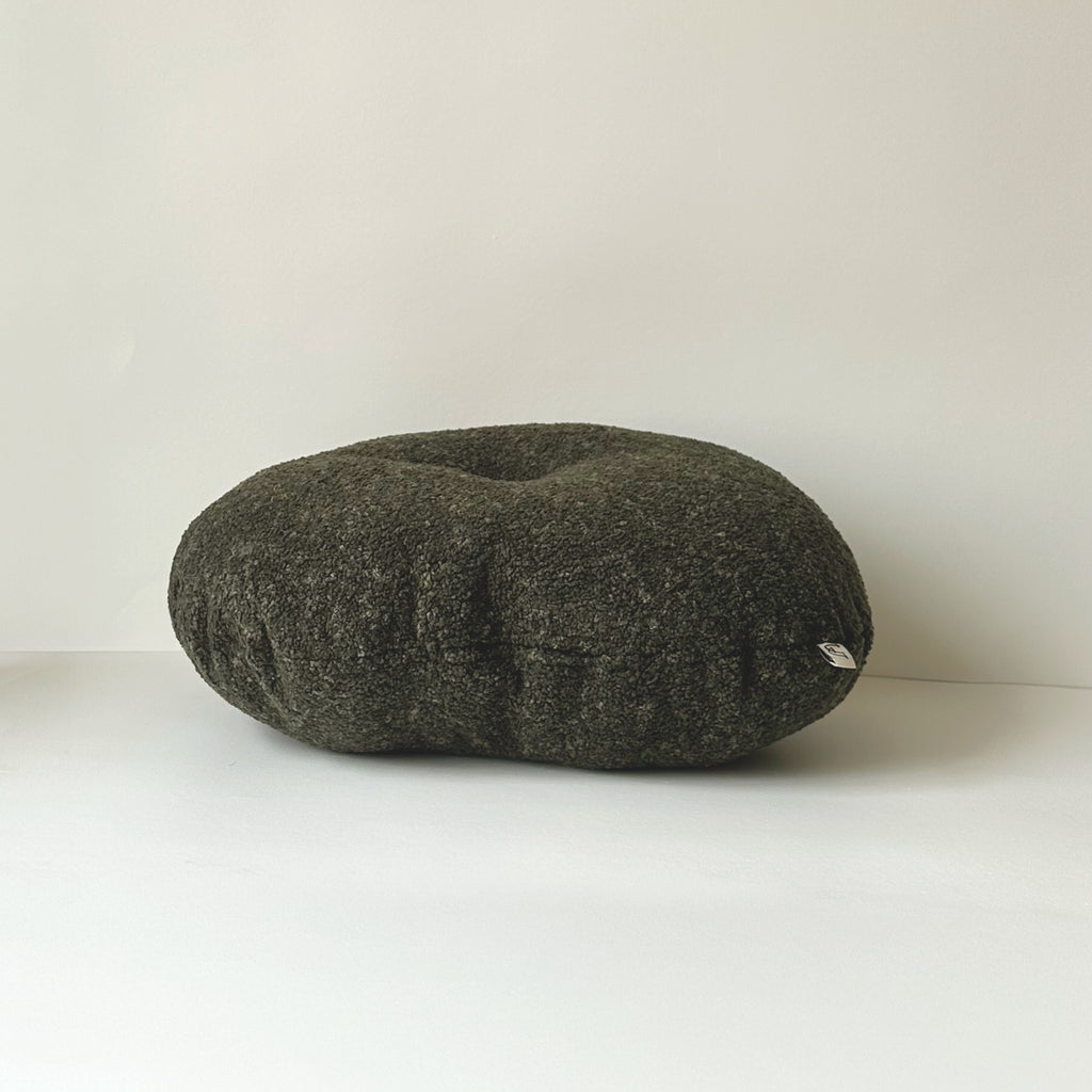 Side view of Cloud Cushion in moss textured bouclé