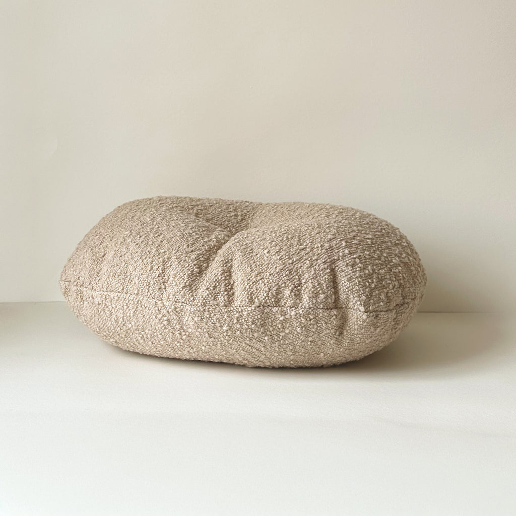 Side view of Cloud Cushion in oatmeal textured bouclé